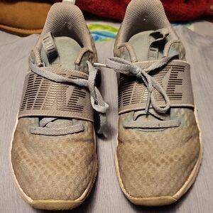 Nike Gray Sneakers with Textured Sole and Low-Top Design